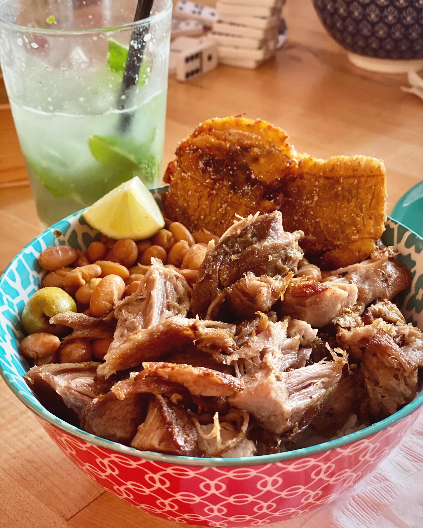 J's Kitchen carne bowl with pernil, beans, tostones and a mojito